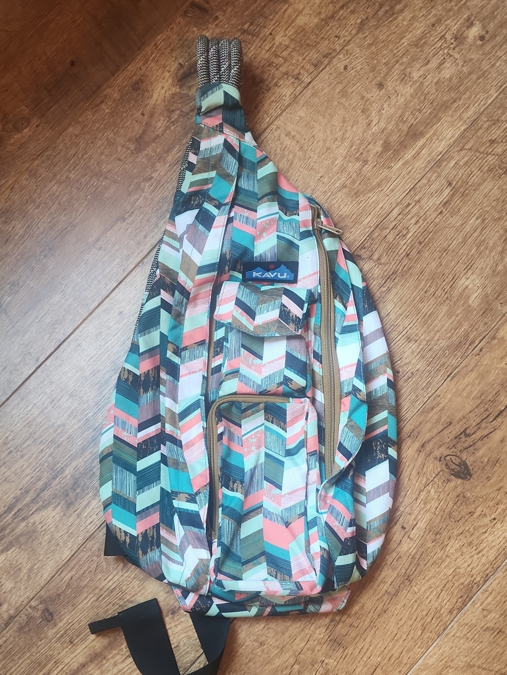 Kavu Chevron Sling Bag in Teal, Coral & Olive Stripes